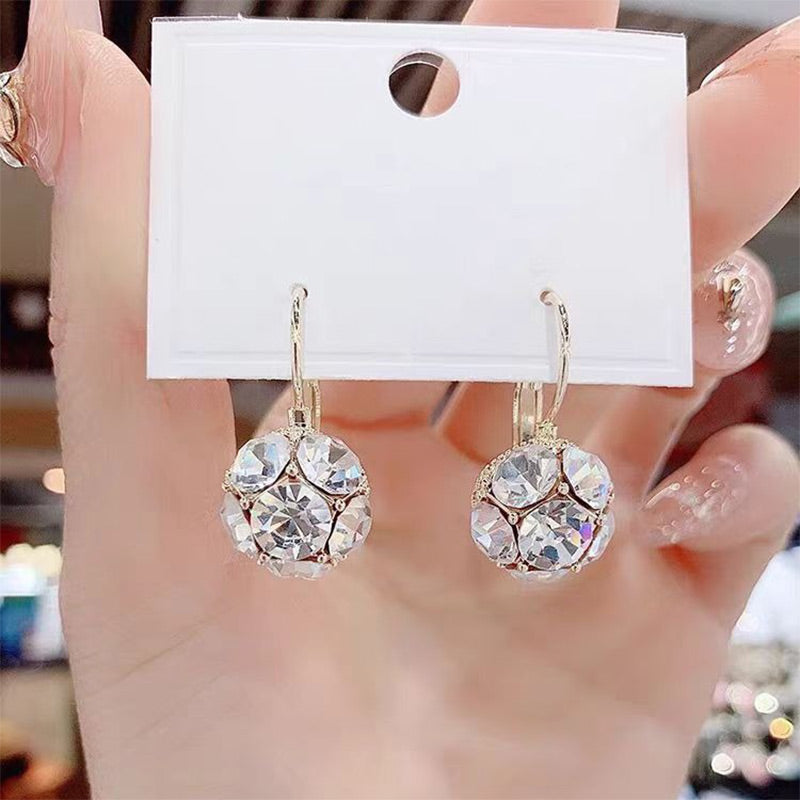 ✨️Boucles d'oreilles pendantes élégantes en forme de sphère de cristal