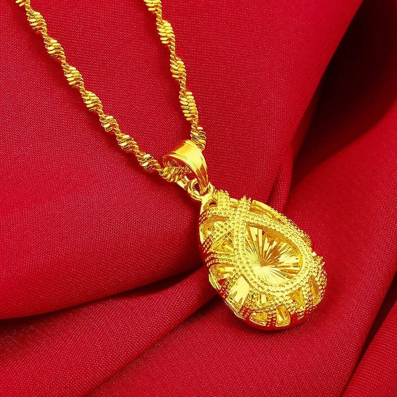 💧55% de réduction🌙Collier élégant en alliage doré avec pendentif en forme de goutte d'eau