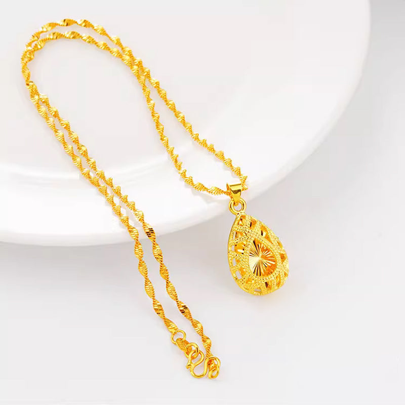 💧55% de réduction🌙Collier élégant en alliage doré avec pendentif en forme de goutte d'eau