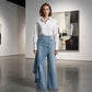 Jean portefeuille asymétrique 👖 À mi-chemin entre la culotte et le pantalon, taille haute pour allonger les jambes, coupe large et fluide, boutons disposés en diagonale : transformez-vous instantanément en fashionista ! ✨