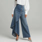 Jean portefeuille asymétrique 👖 À mi-chemin entre la culotte et le pantalon, taille haute pour allonger les jambes, coupe large et fluide, boutons disposés en diagonale : transformez-vous instantanément en fashionista ! ✨